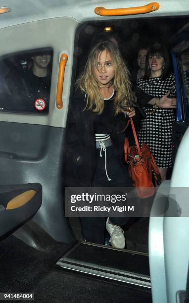 Suki Waterhouse and Nat Wolff seen leaving Hyde Park after BST: The Strokes on June 18, 2015 in London, England.