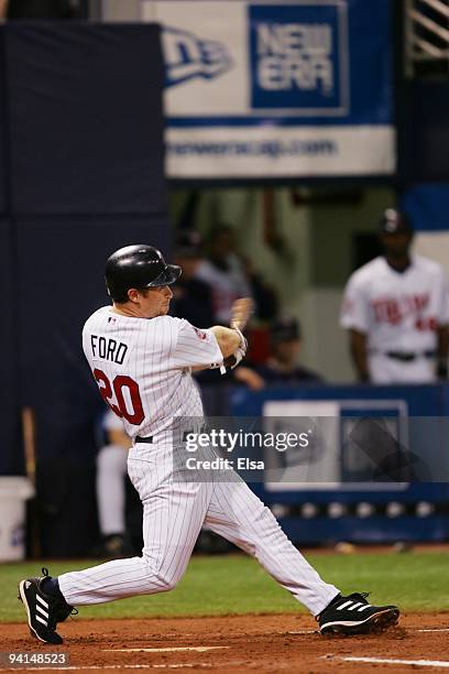 Lew Ford of the Minnesota Twins at bat against the San Francisco Giants during the game on June 15, 2005 at the Hubert H. Humphrey Metrodome in...