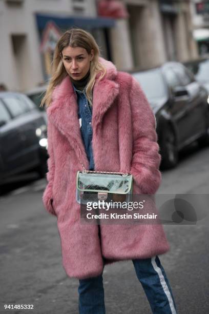 Editor in chief of MINT Irina Lakicevic wears a Hope jacket, Chanel bag day 4 of Paris Womens Fashion Week Spring/Summer 2018, on March 1, 2018 in...