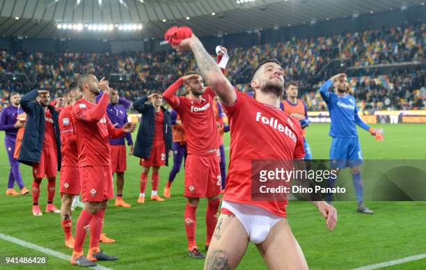Fiorentina players celebrate victory with supporters after the serie A match between Udinese Calcio and ACF Fiorentina at Stadio Friuli on April 3,...