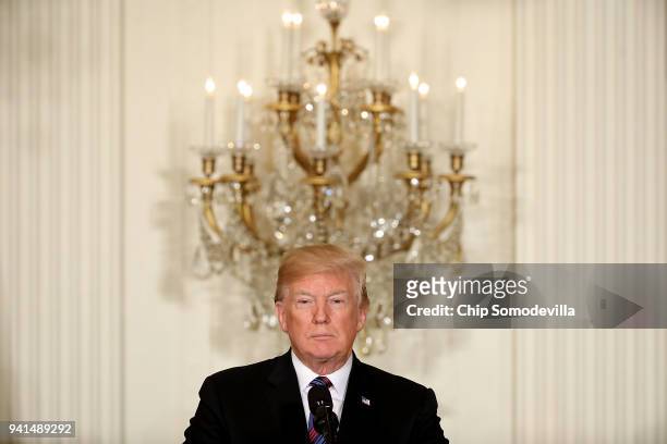 President Donald Trump participates in a joint news conference with Estonian President Kersti Kaljulaid, Latvian President Raimonds Vejonis and...