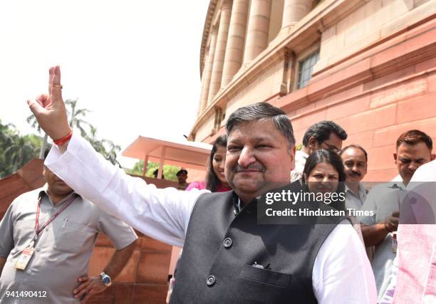 Newly elected BJP Rajya Sabha MP Anil Agarwal with his family members at Parliament House on April 3, 2018 in New Delhi, India. The proceedings of...