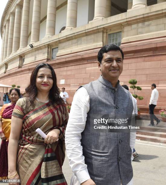 Newly elected BJP Rajya Sabha MP Anil Baluni with his wife at Parliament House on April 3, 2018 in New Delhi, India. The proceedings of the Lok Sabha...