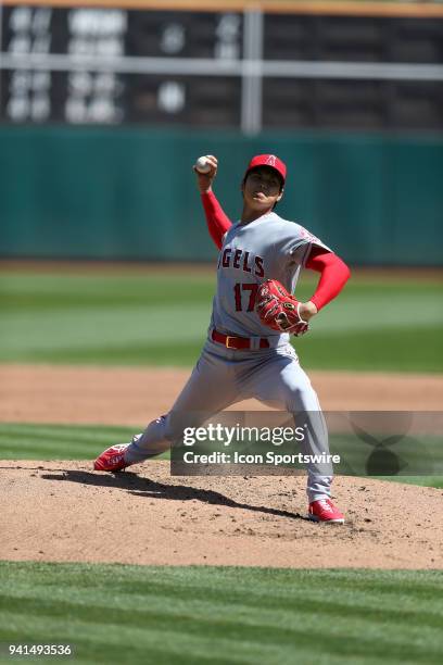 Japanese phenom Shohei Ohtani throws a pitch during his MLB pitching debut for the Los Angeles Angels during a MLB game between the Los Angeles...