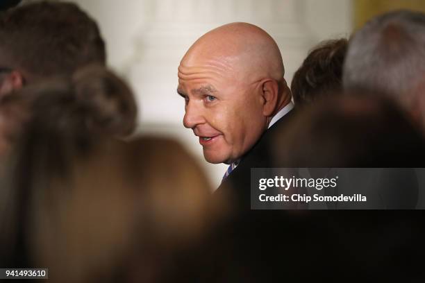 White House National Security Advisor H.R. McMaster visits with fellow officials before a joint news conference with President Donald Trump, Estonian...