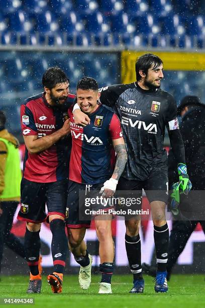 Luca Rossettini, Gianluca Lapadula and Mattia Perin of Genoa celebrate after the serie A match betweenGenoa CFC and Cagliari Calcio at Stadio Luigi...