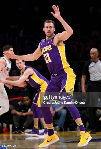 Travis Wear of the Los Angeles Lakers looks for a pass in the game against the Dallas Mavericks at Staples Center on March 28, 2018 in Los Angeles,...