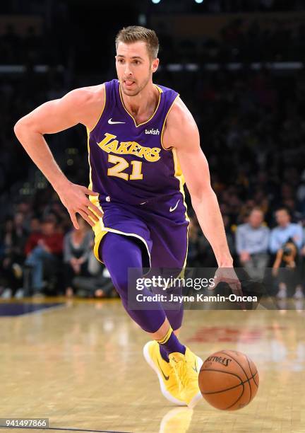 Travis Wear of the Los Angeles Lakers handles the ball in the game against the Dallas Mavericks at Staples Center on March 28, 2018 in Los Angeles,...