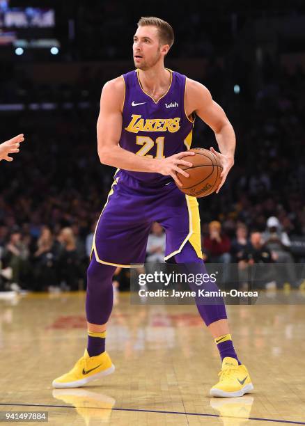 Travis Wear of the Los Angeles Lakers handles the ball in the game against the Dallas Mavericks at Staples Center on March 28, 2018 in Los Angeles,...