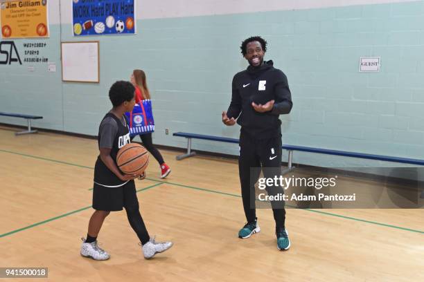 Patrick Beverley of the LA Clippers participates in the announcement of a major gift to renovate nearly 350 public basketball courts in the city at...