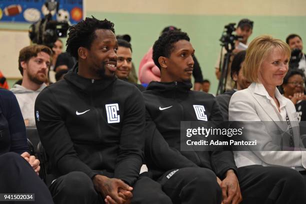 Patrick Beverley and Lou Williams of the LA Clippers participate in the announcement of a major gift to renovate nearly 350 public basketball courts...