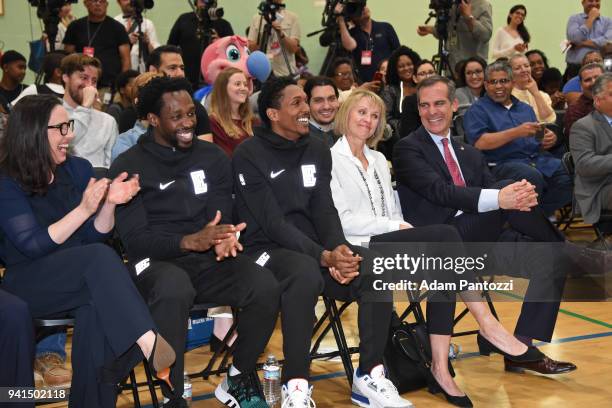 Patrick Beverley and Lou Williams of the LA Clippers participate in the announcement of a major gift to renovate nearly 350 public basketball courts...