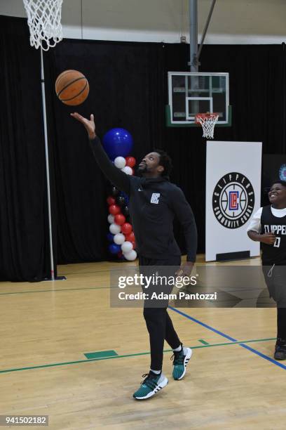 Patrick Beverley of the LA Clippers participates in the announcement of a major gift to renovate nearly 350 public basketball courts in the city at...