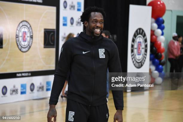 Patrick Beverley of the LA Clippers participates in the announcement of a major gift to renovate nearly 350 public basketball courts in the city at...