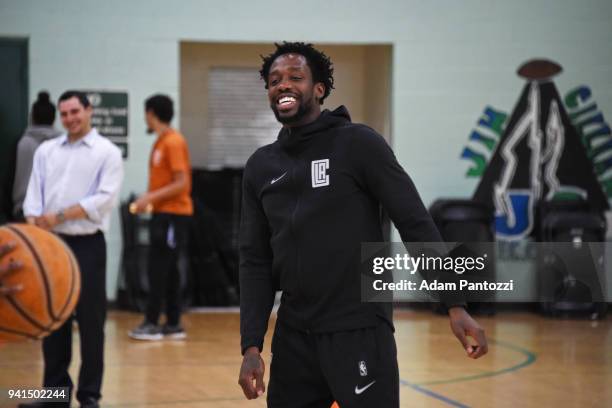 Patrick Beverley of the LA Clippers participates in the announcement of a major gift to renovate nearly 350 public basketball courts in the city at...