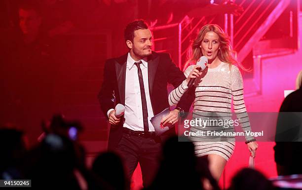Giovanni Zarrella and Charlotte Engelhardt pose during the TV Show 'Popstars You & I' semi final at the Koenigspilsener Arena on December 8, 2009 in...