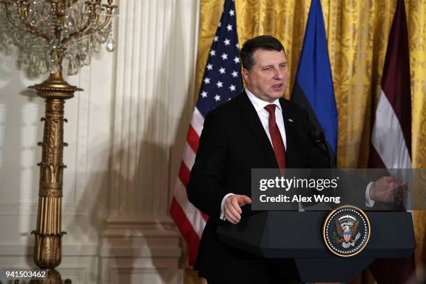 Latvian President Raimonds Vejonis speaks during a joint news conference in the East Room of the White House April 3, 2018 in Washington, DC. Marking...