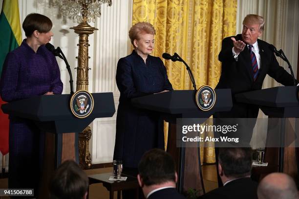 Estonian President Kersti Kaljulaid, Lithuanian President Dalia Grybauskaite and U.S. President Donald Trump, hold a joint news conference in the...