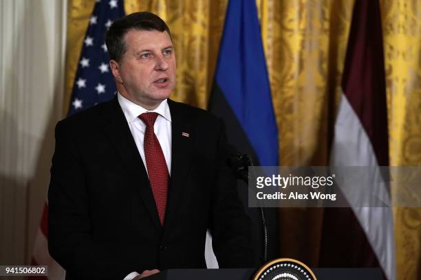 Latvian President Raimonds Vejonis speaks during a joint news conference in the East Room of the White House April 3, 2018 in Washington, DC. Marking...