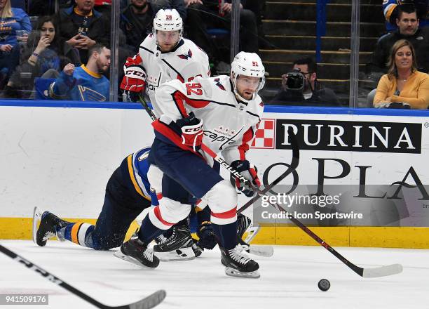 April 02: Washington Capitals center Evgeny Kuznetsov chases down a loose puck in the third period during a NHL game between the Washington Capitals...