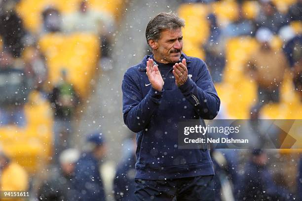 Head Coach Dave Wannstedt of the University of Pittsburgh Panthers cheers on the team during the game against the University of Cincinnati Bearcats...