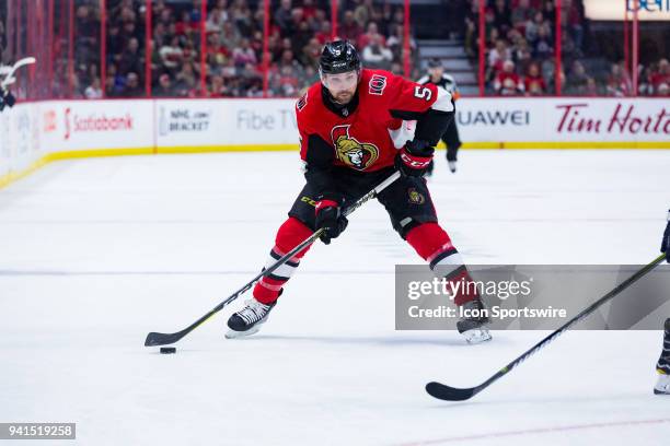 Ottawa Senators Defenceman Cody Ceci skates with the puck during second period National Hockey League action between the Winnipeg Jets and Ottawa...