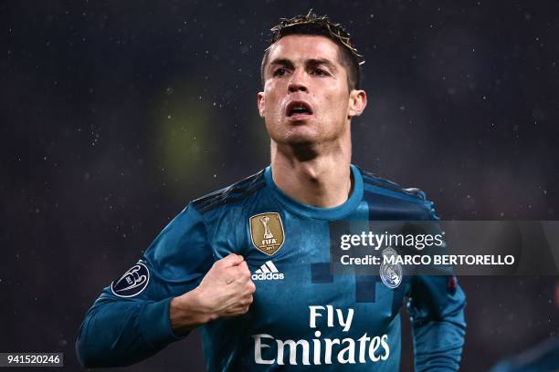 Real Madrid's Portuguese forward Cristiano Ronaldo celebrates his second goal during the UEFA Champions League quarter-final first leg football match...