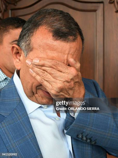 Former Honduran President Porfirio Lobo Sosa gestures after the arrival of the Administrative Office of Seized Assets to confiscate his residence in...