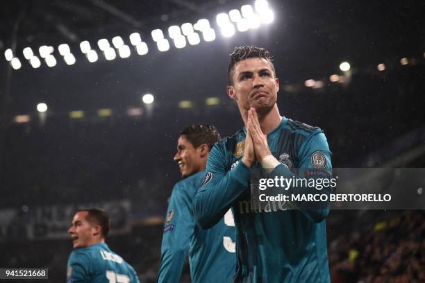 Real Madrid's Portuguese forward Cristiano Ronaldo celebrates after scoring a second goal during the UEFA Champions League quarter-final first leg...