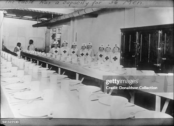 Main room, American Red Cross canteen, Detroit in Michigan Central Station. The table has a capacity of 56 men in 1919 in Detroit, Michigan.