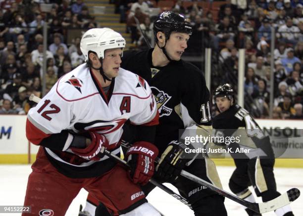 Eric Staal of the Carolina Hurricanes and Jordan Staal of the Pittsburgh Penguins battle for position in the third period at Mellon Arena on December...