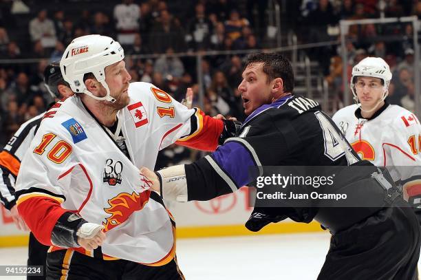 Brian McGrattan of the Calgary Flames fights Raitis Ivanans of the Los Angeles Kings during the game on December 7, 2009 at Staples Center in Los...