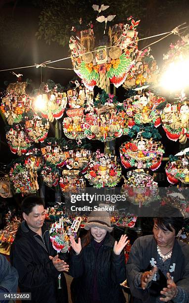 Decorated bamboo rakes, or Kumade are displayed during Oji Kumade Festival at Oji Shrine on December 6, 2009 in Tokyo, Japan. The annual event of...