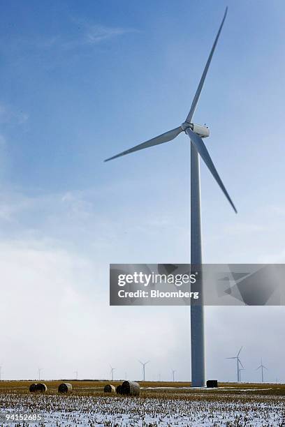 Suzlon wind turbines operate as snow falls at the Iberdrola Renewables Buffalo Ridge Wind Power Project in Elkton, South Dakota, U.S., on Monday,...