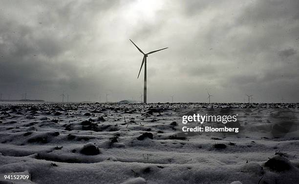 Suzlon wind turbines operate as snow falls at the Iberdrola Renewables Buffalo Ridge Wind Power Project in Elkton, South Dakota, U.S., on Monday,...