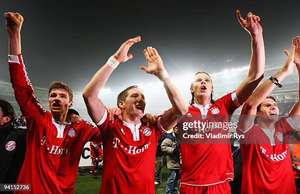 Thomas Mueller, Bastian Schweinsteiger, Daniel Van Buyten and Mario Gomez of Bayern Muenchen celebrate after winning 1:4 at the UEFA Champions League...