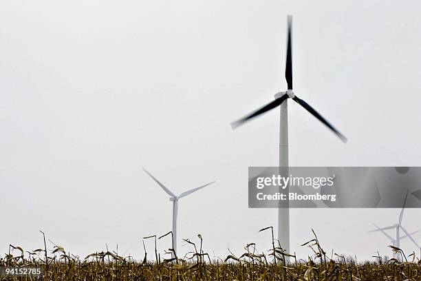 Suzlon wind turbines operate as snow falls at the Iberdrola Renewables Buffalo Ridge Wind Power Project in Elkton, South Dakota, U.S., on Monday,...