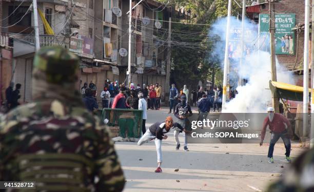 Protesters throwing stones towards the police during the clashes between Indian forces and Protesters in Soura Srinagar. For the second consecutive...