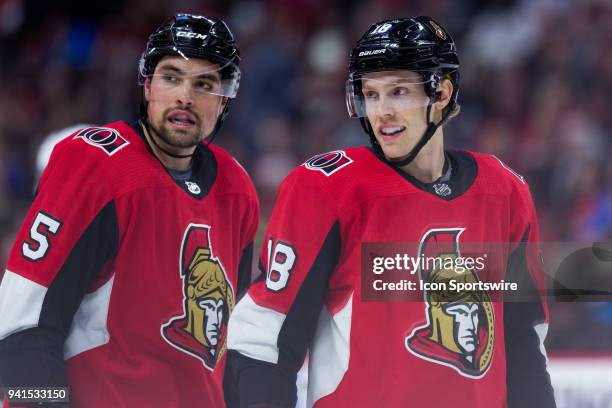 Ottawa Senators Left Wing Ryan Dzingel and Ottawa Senators Defenceman Cody Ceci have a conversation prior to a face-off during first period National...