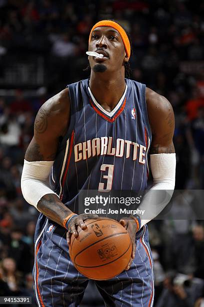 Gerald Wallace of the Charlotte Bobcats shoots a free throw during the game against the Cleveland Cavaliers at Time Warner Cable Arena on November...