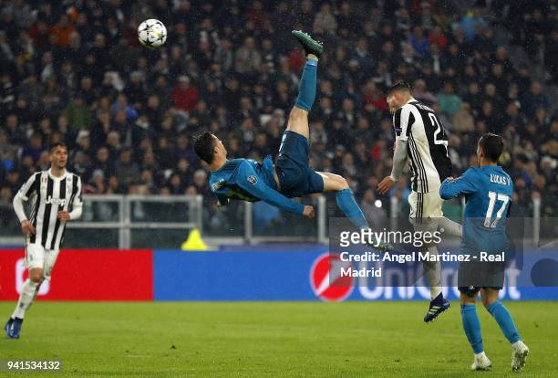 Cristiano Ronaldo of Real Madrid scores his team's second goal during the UEFA Champions League Quarter Final Leg One match between Juventus and Real...
