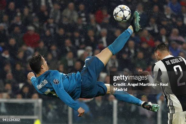 Cristiano Ronaldo of Real Madrid scores his team's second goal during the UEFA Champions League Quarter Final Leg One match between Juventus and Real...