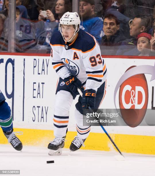 Ryan Nugent-Hopkins of the Edmonton Oilers skates with the puck in NHL action against the Vancouver Canucks on March 2018 at Rogers Arena in...