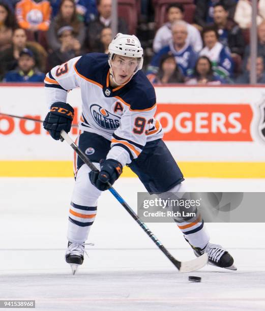 Ryan Nugent-Hopkins of the Edmonton Oilers skates with the puck in NHL action against the Vancouver Canucks on March 2018 at Rogers Arena in...