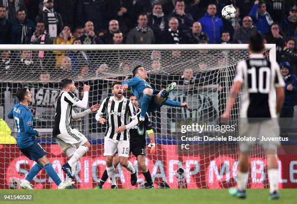 Cristiano Ronaldo of Real Madrid scores his second goal during the UEFA Champions League Quarter Final Leg One match between Juventus and Real Madrid...