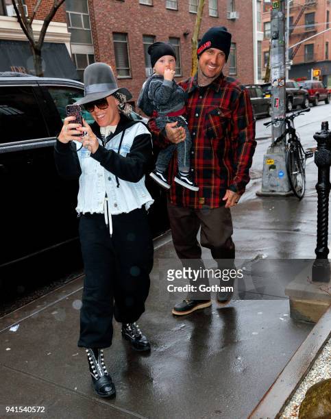 Pink turns the camera on the paps when she arrives at Blue Ribbon Sushi with son Jameson and Cary Hart on April 3, 2018 in New York City.