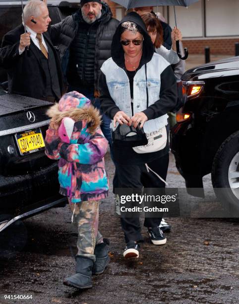 Pink turns the camera on the paps when she arrives at Blue Ribbon Sushi with son Jameson and Cary Hart on April 3, 2018 in New York City.