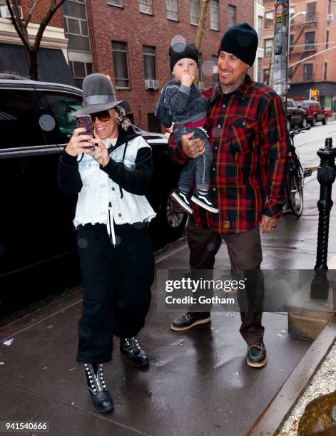 Pink turns the camera on the paps when she arrives at Blue Ribbon Sushi with son Jameson and Cary Hart on April 3, 2018 in New York City.