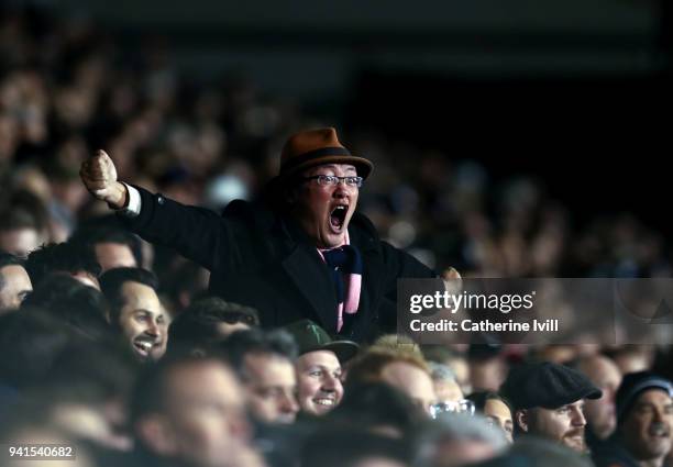Fan of Fulham cheers on his team during the Sky Bet Championship match between Fulham and Leeds United at Craven Cottage on April 3, 2018 in London,...