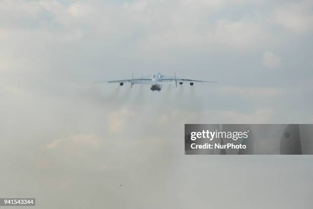 Worlds largest aircraft, the Antonov An-225 Mriya cargo aeroplane, takes off from the Antonov plant's airdrome in Gostomel on April 3, 2018. The...